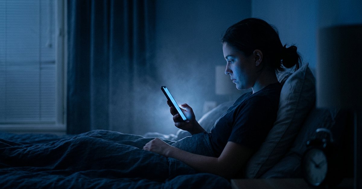 Blue light from screens delays your sleep hormone - photographed for the Why Can't I Sleep guide. Images and Photos created by www.why-cant-sleep.com
